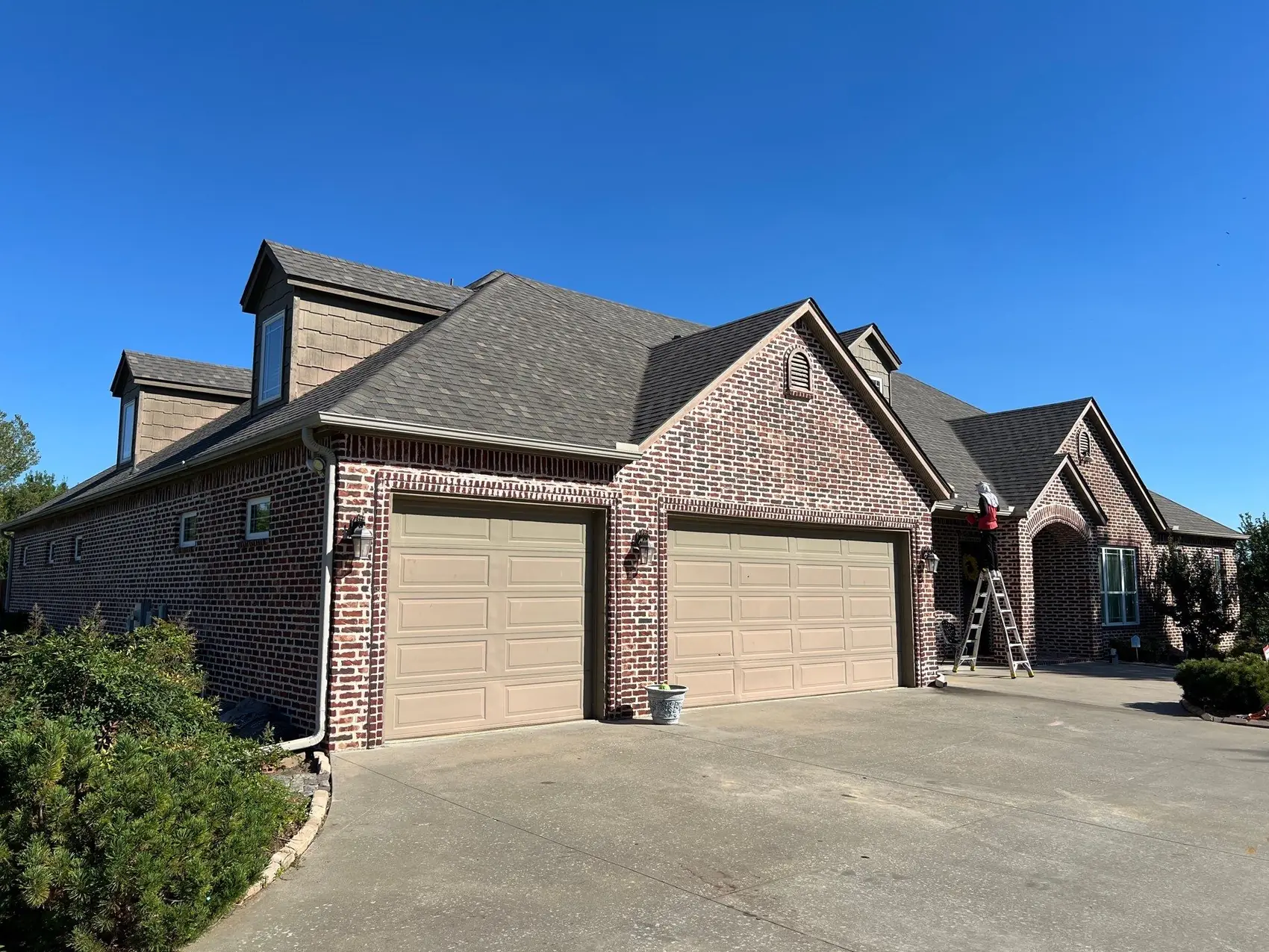 Completed roof replacement on a Jenks home by FireHouse Roofing