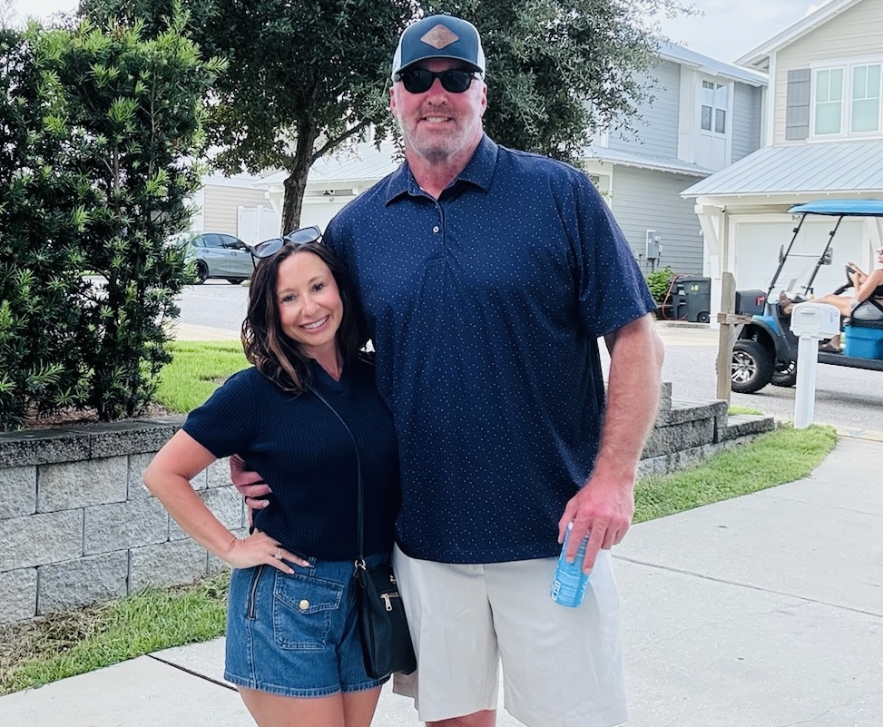 Russ Hawkins, Owner and Founder of FireHouse Roofing Co., with his wife Jaybee