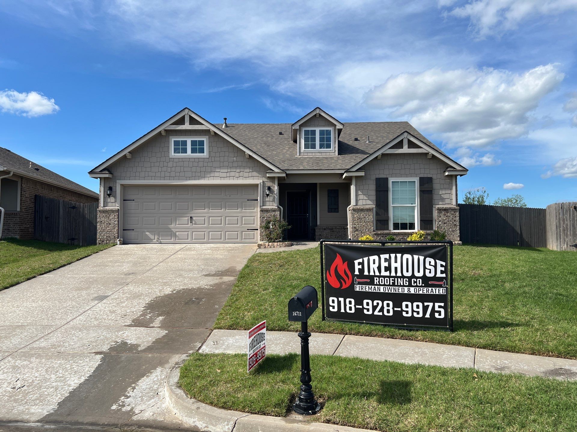 Completed FireHouse Roofing Co. roof replacement on a craftsman-style home in Owasso, Oklahoma